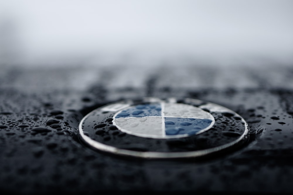 shallow focus photo BMW logo