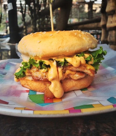 A playful illustration of a burger with musical notes around it.