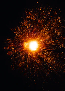 A massive solar flare bursting from the sun, illuminating space.