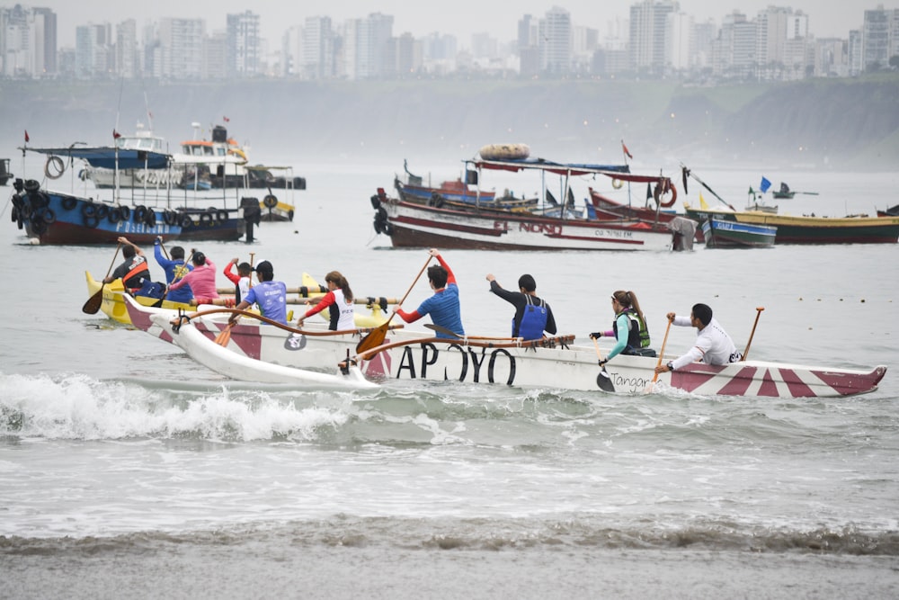 group of people riding on paddle boat