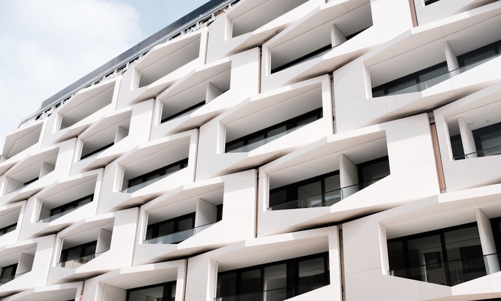 low angle view photography of white commercial building