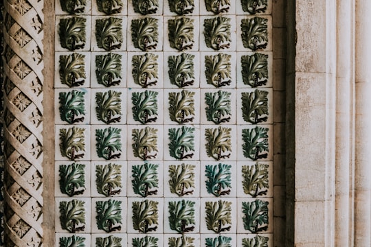 Elegant classic plaster tile arrangement on a cozy living room wall