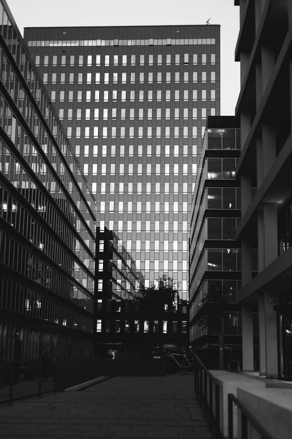 grayscale photography of high-rise buildings