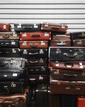 stacks of assorted suitcases