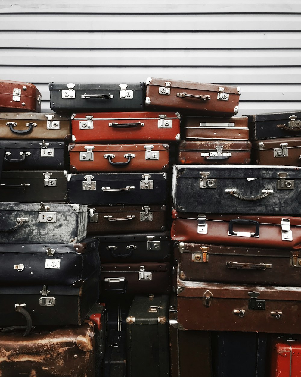 stacks of assorted suitcases