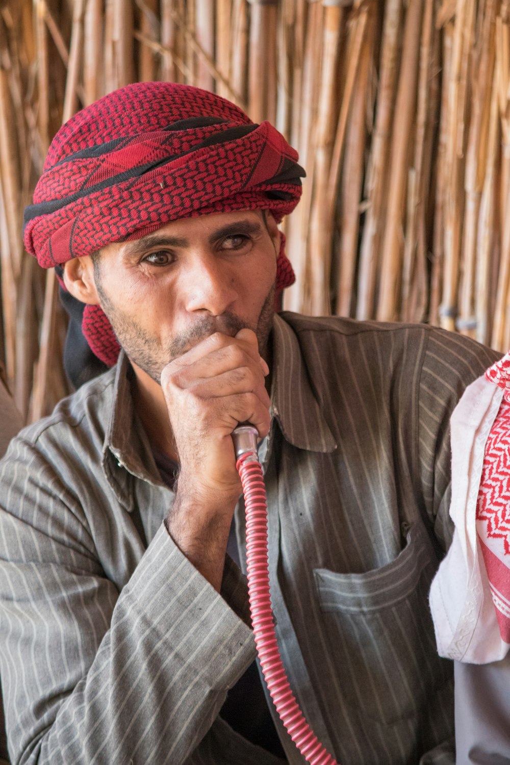 man using hookah