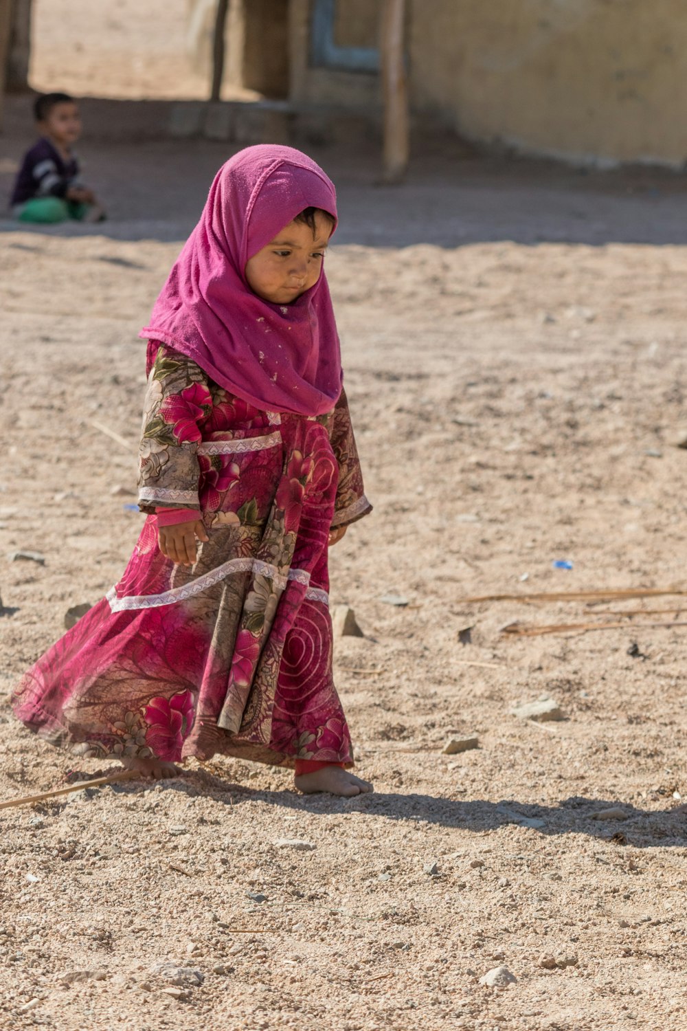 girl wearing pink hijab during daytime