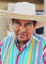 man wearing brown hat