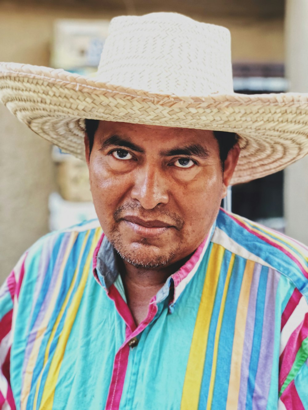 man wearing brown hat