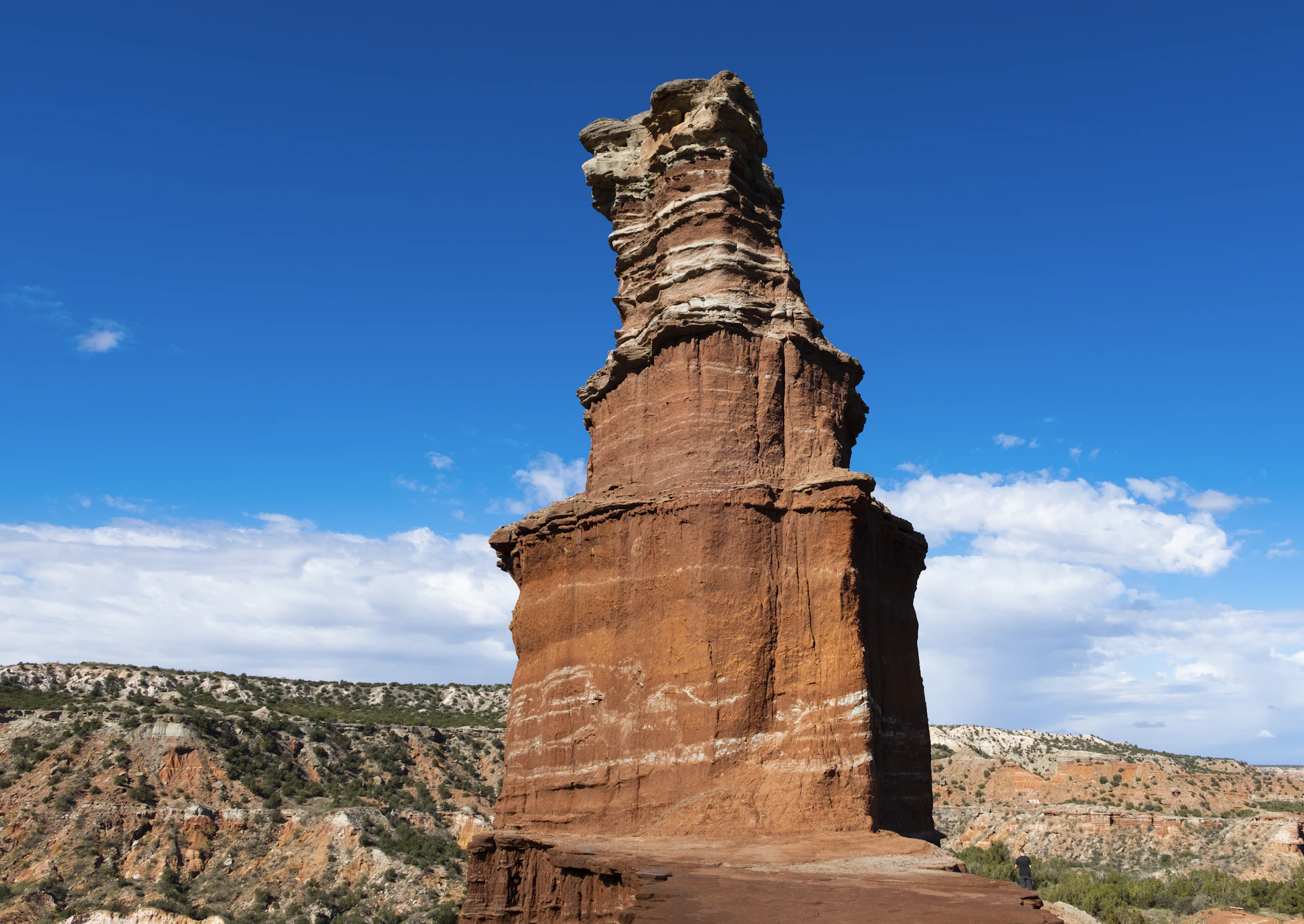 brown cliff under blue sky