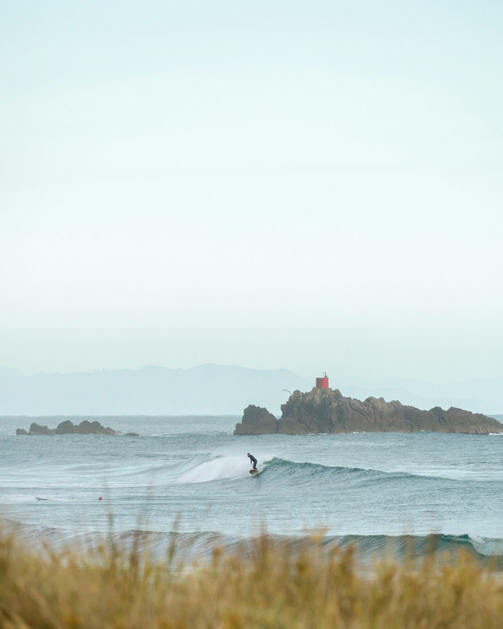 man surfing on sea waves