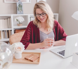 Contented looking woman at a desk