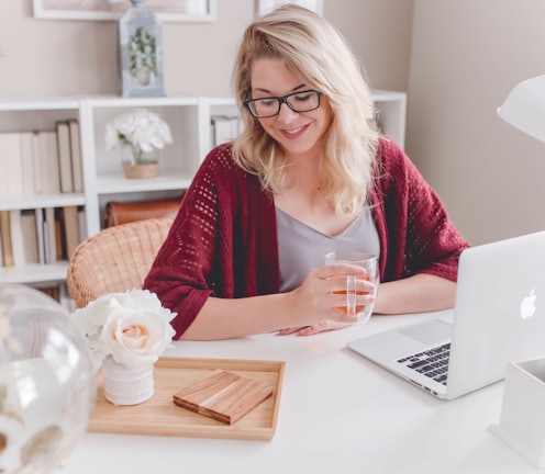 Contented looking woman at a desk