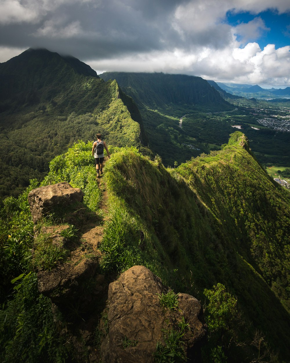 man standing on hill