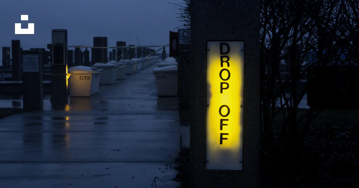 Lighted drop off signage photo – Free Night Image on Unsplash