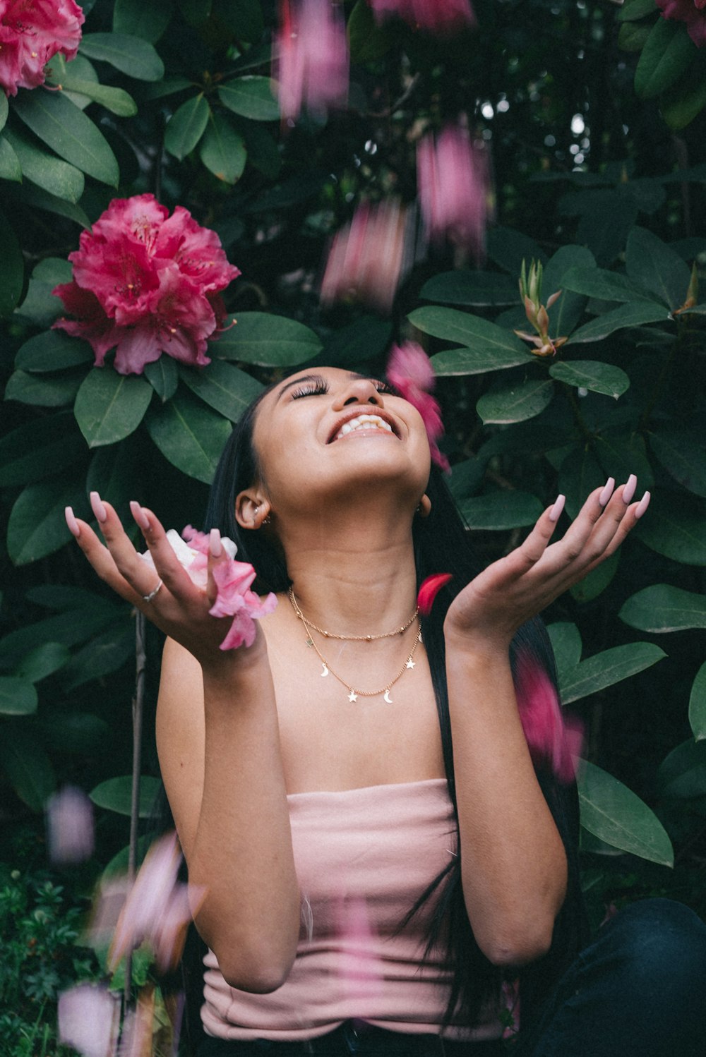 woman raising her hands