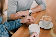 man and woman holding hands