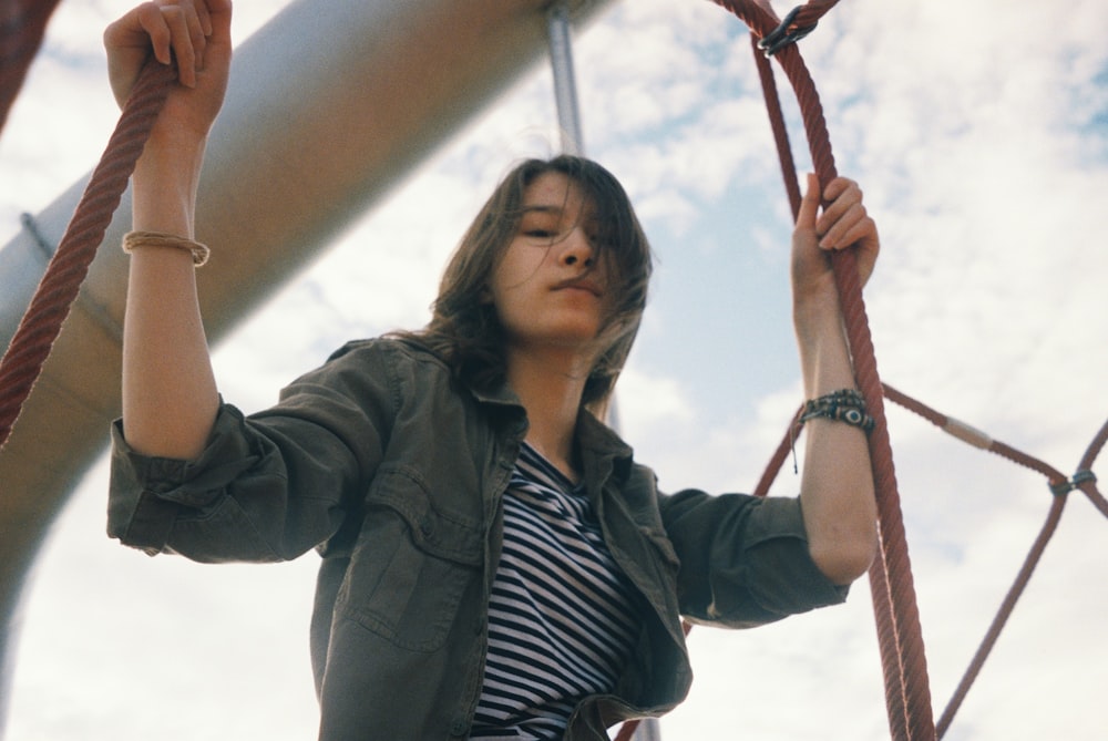 woman holding railing