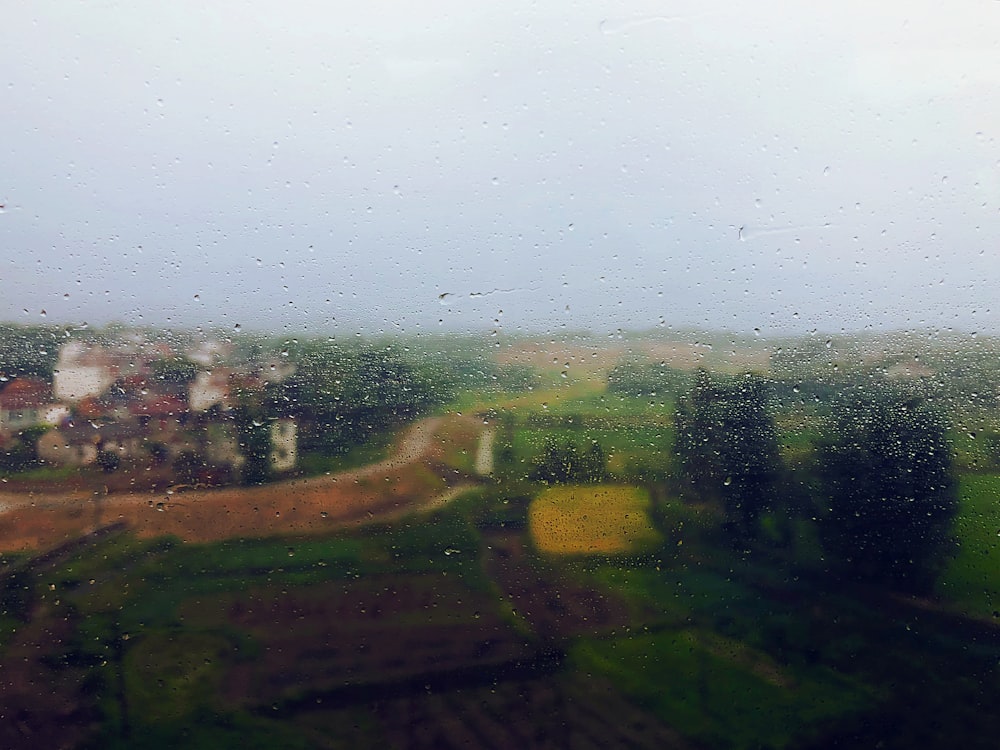 a view of a rural countryside from a window