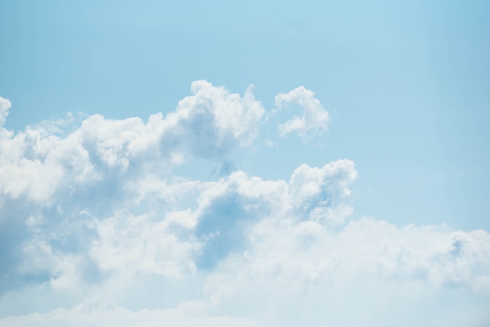 white clouds under blue sky