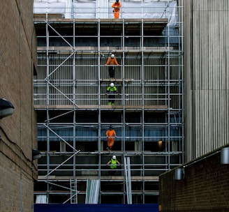 men on scaffoldings