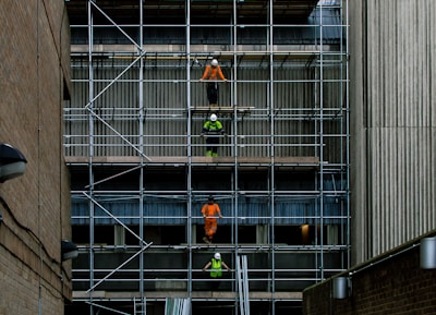 men on scaffoldings