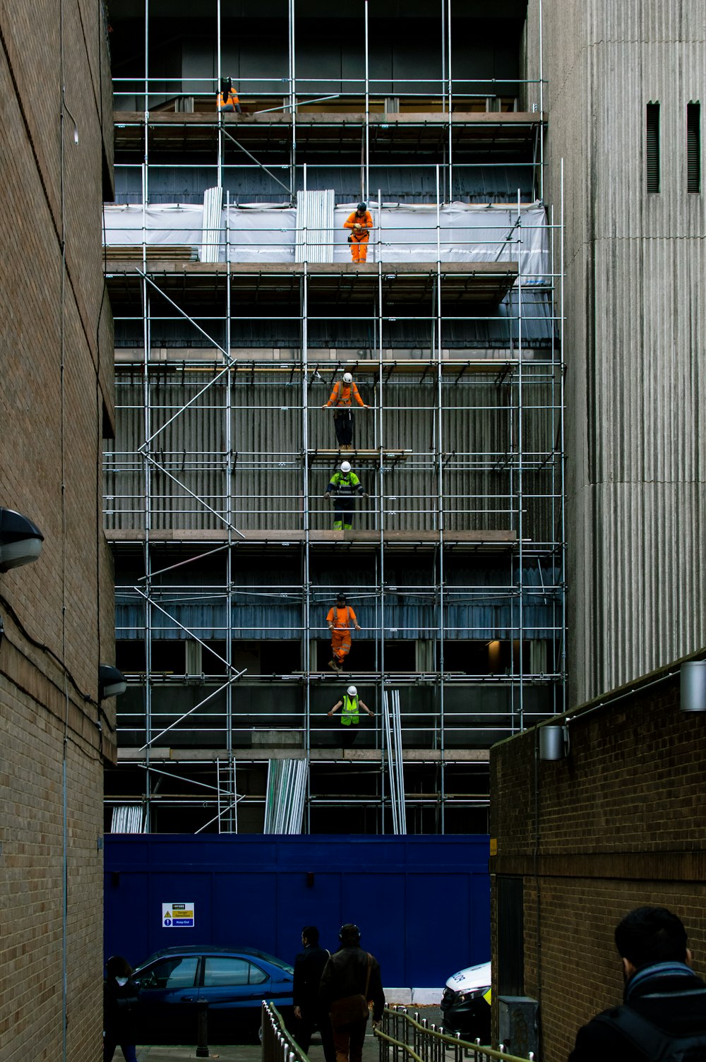 men on scaffoldings