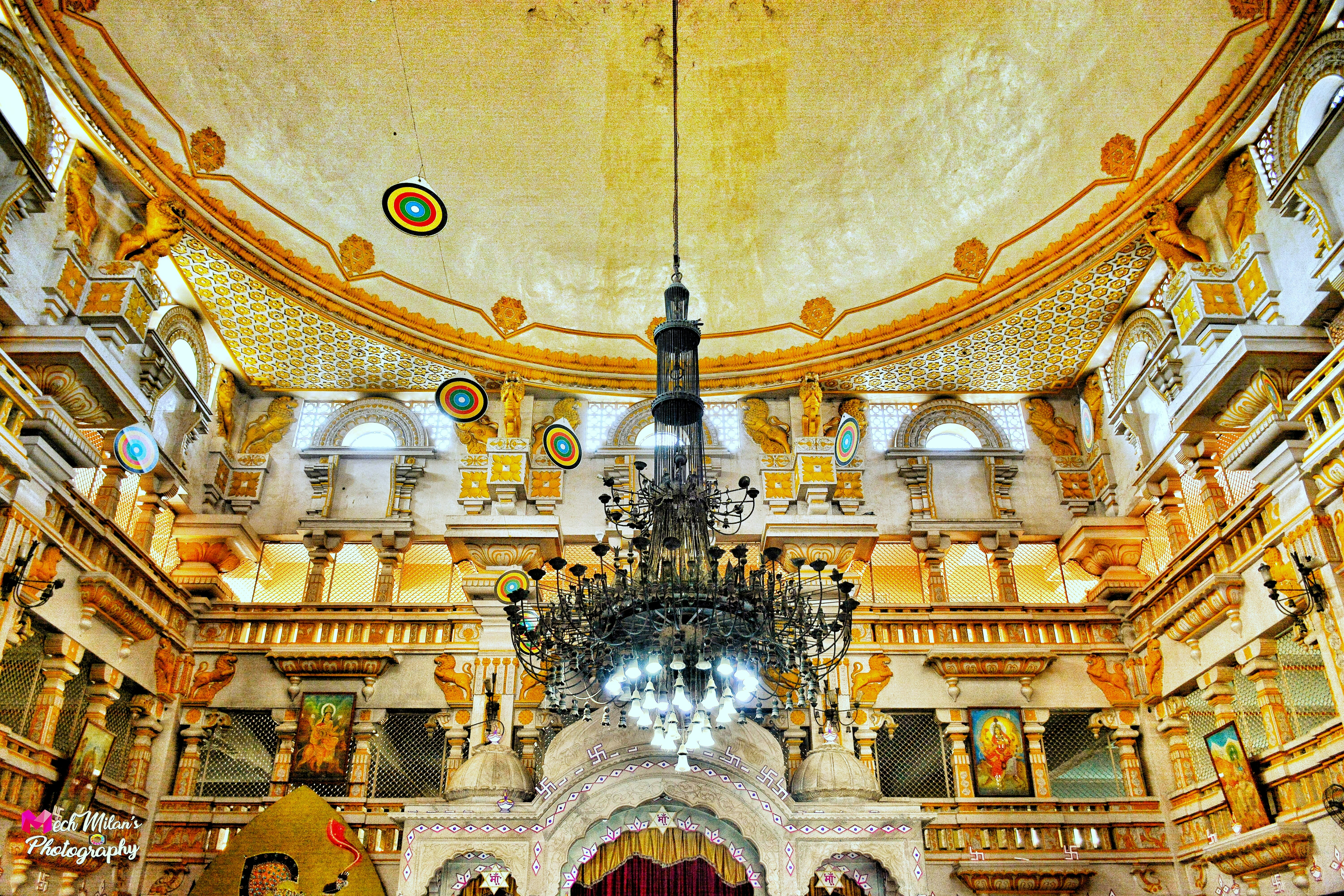 Opulent golden Versailles-inspired interior, dramatic candlelight, gilded architecture, deep atmospheric shadows