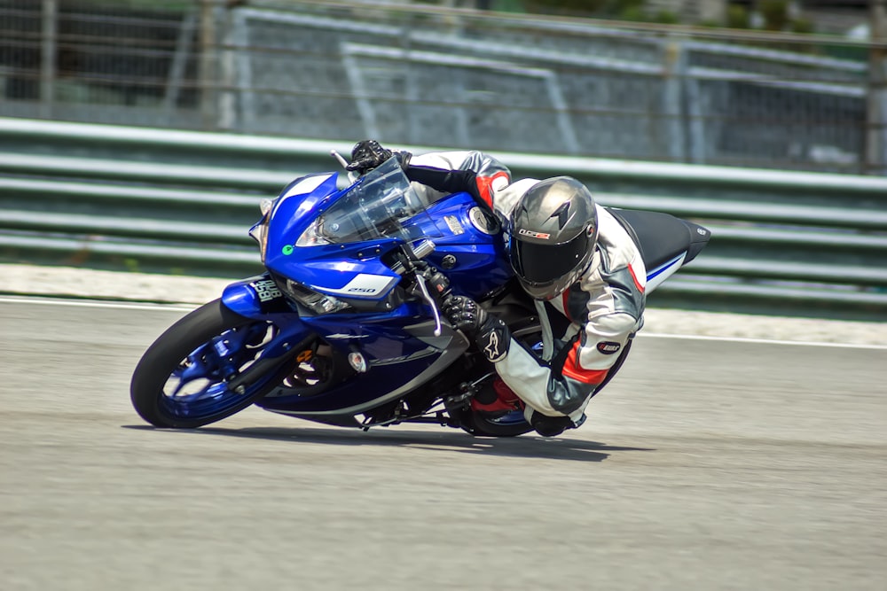 man riding on sport bike