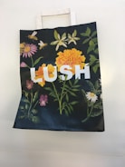Custom paper bags with premium textures and vibrant floral prints