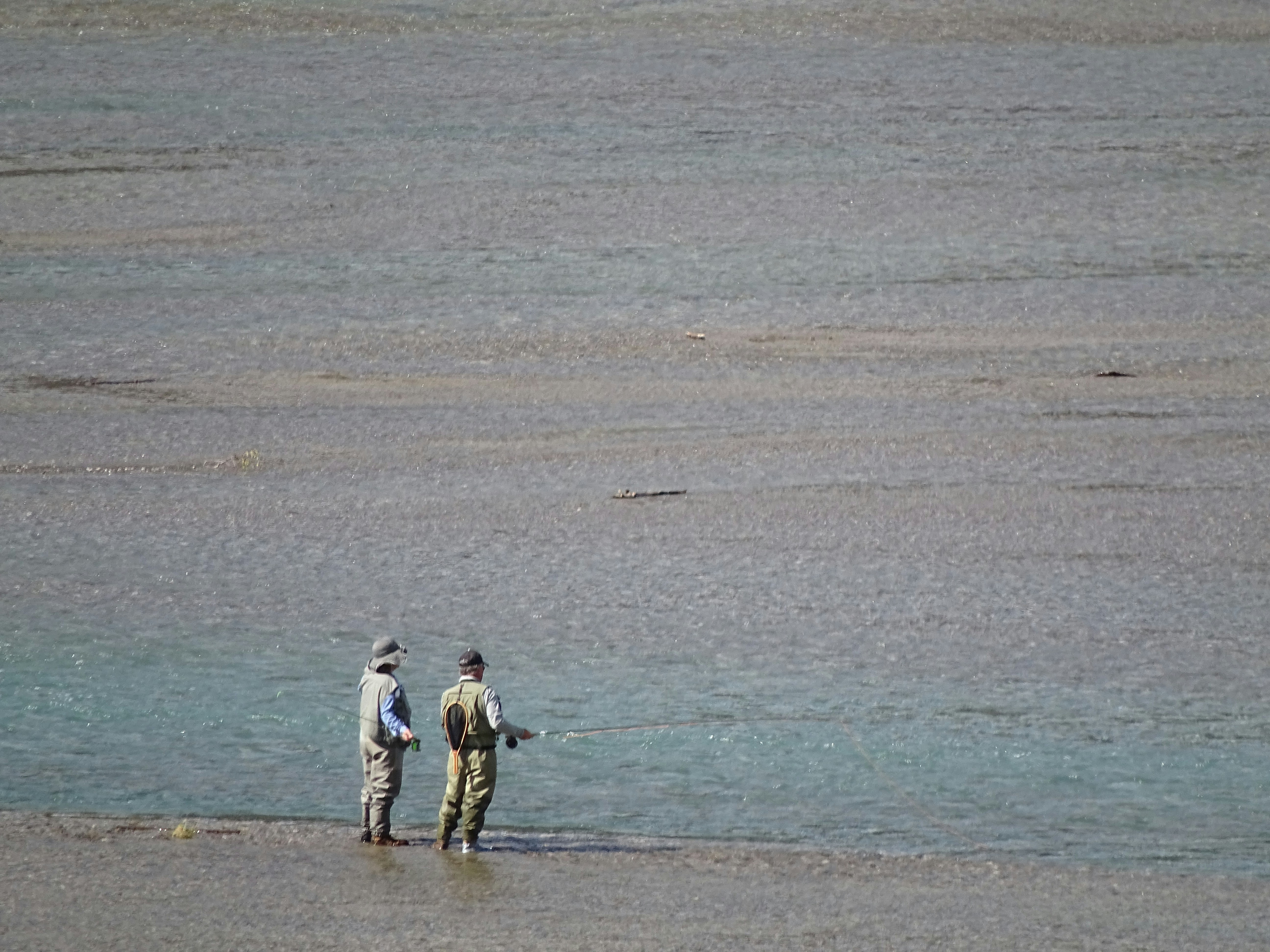 two men fishing at sea
