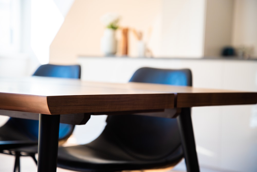 selective focus photography of table and chairs