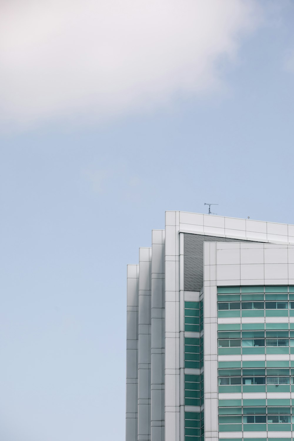 white and green concrete building