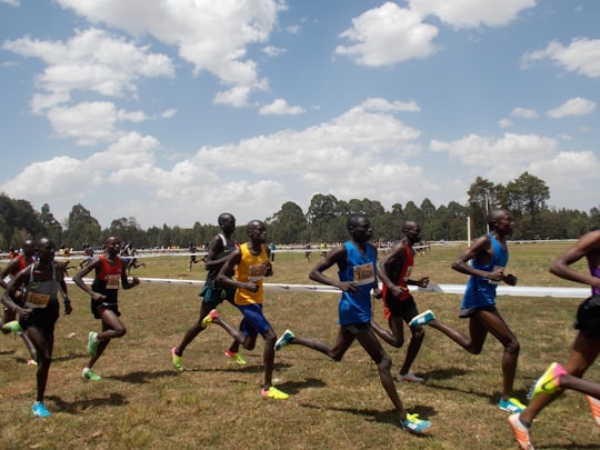 group of men running on field in Eldoret Kenya