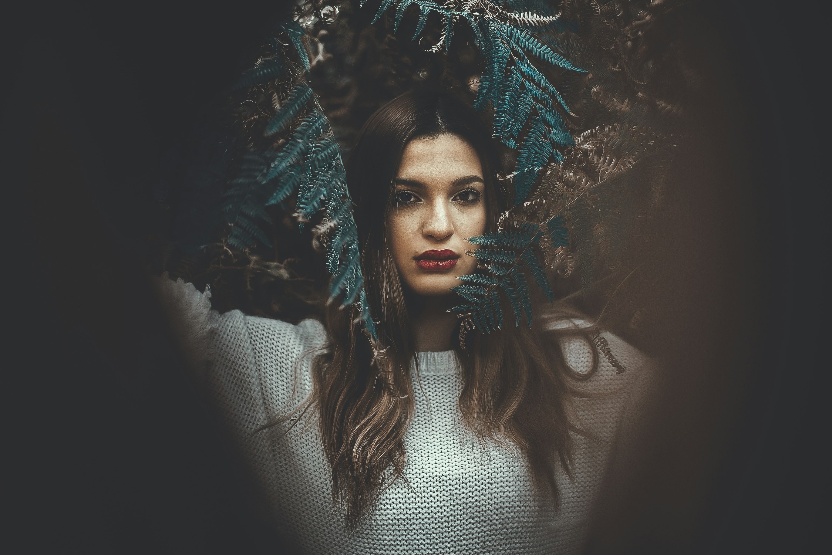 woman in white turtleneck sweater