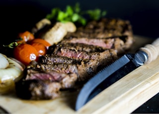 grilled steak near steak knife