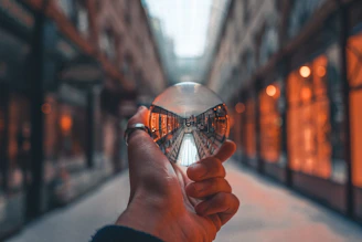 Close-up of a crystal ball glowing gently in a calm, modern setting.