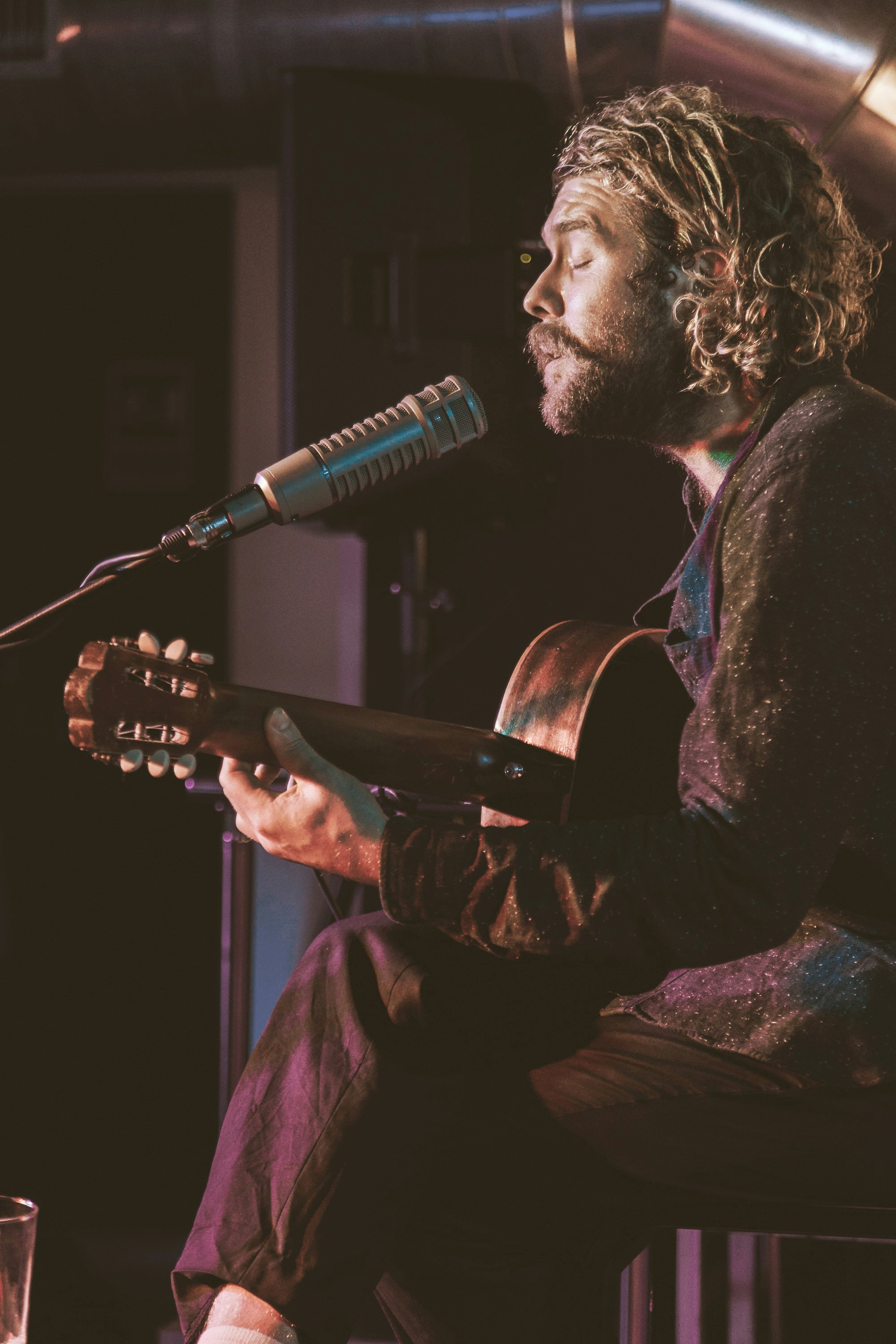 man playing classical guitar