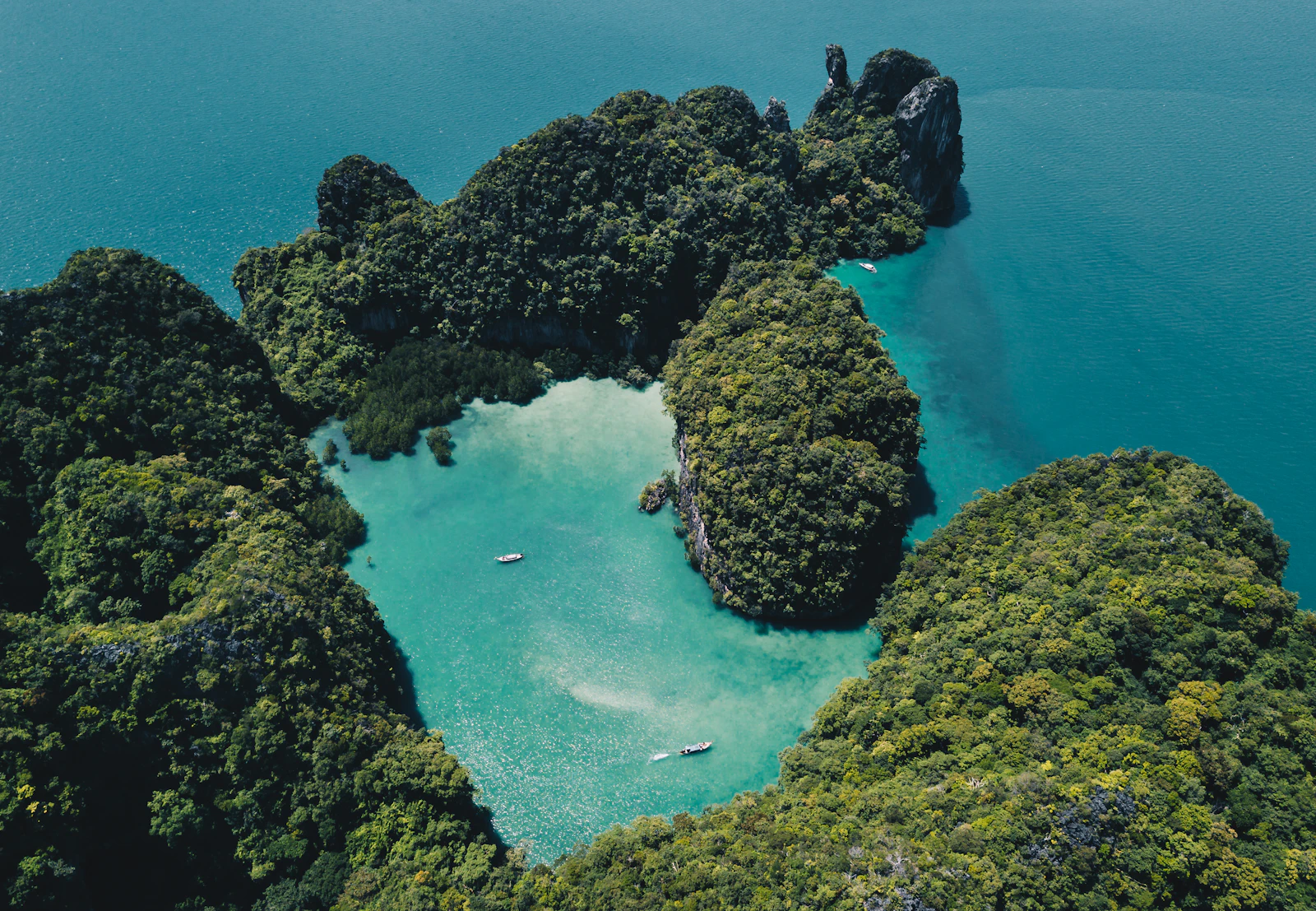 Aerial view of jungle islands in turquoise sea, Thailand