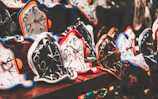 An abstract artwork depicting the passage of time with swirling clocks.