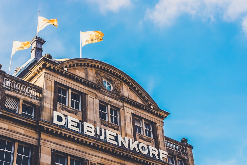 low angle photography of Deb'Jenkorf building