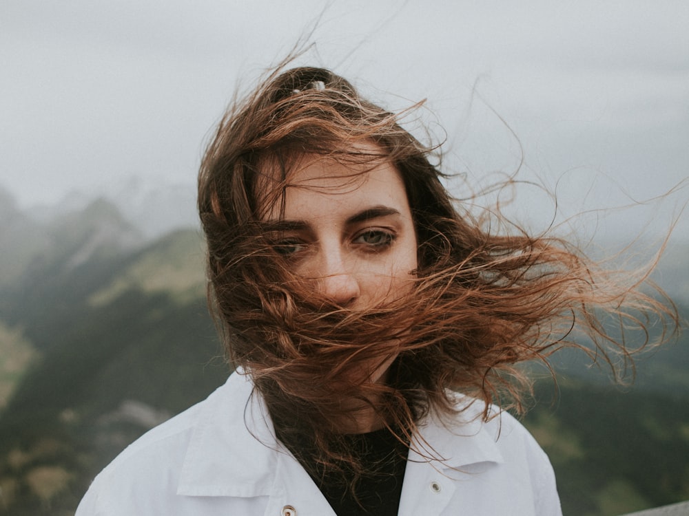 woman in white collared top