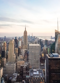 A city skyline at dusk symbolizing the global reach of financial markets.