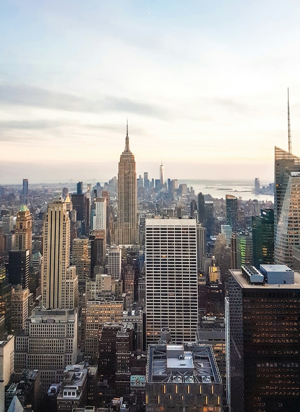 aerial photography of concrete buildings under clear blue sky