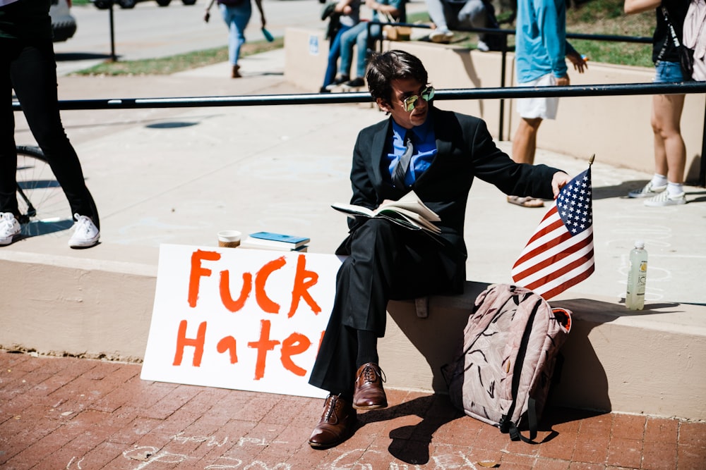 man holding U.S flag