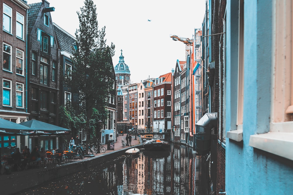 body of water between buildings