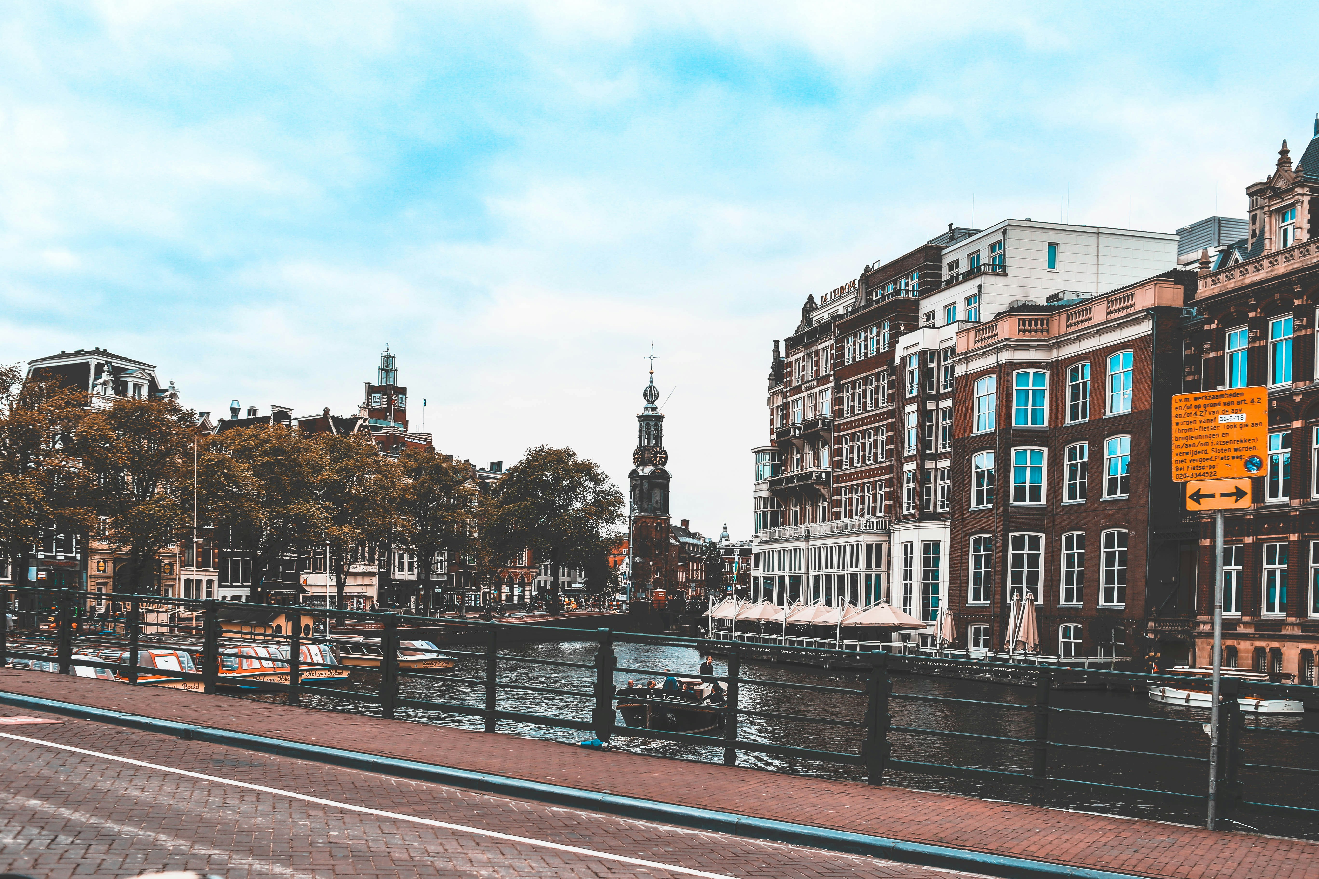 boat on the lake near the buildings, 