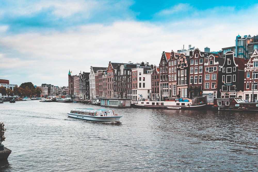 boat sail near buildings