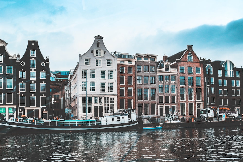 boat docked near building