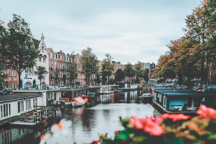 Beautiful European city canals and architecture across seasons